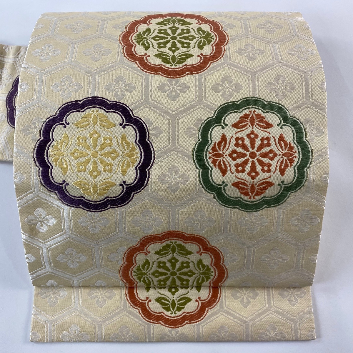 名古屋帯 名品 人間国宝 喜多川平朗 華文 亀甲 唐織 金糸 クリーム 正絹 【中古】拍卖