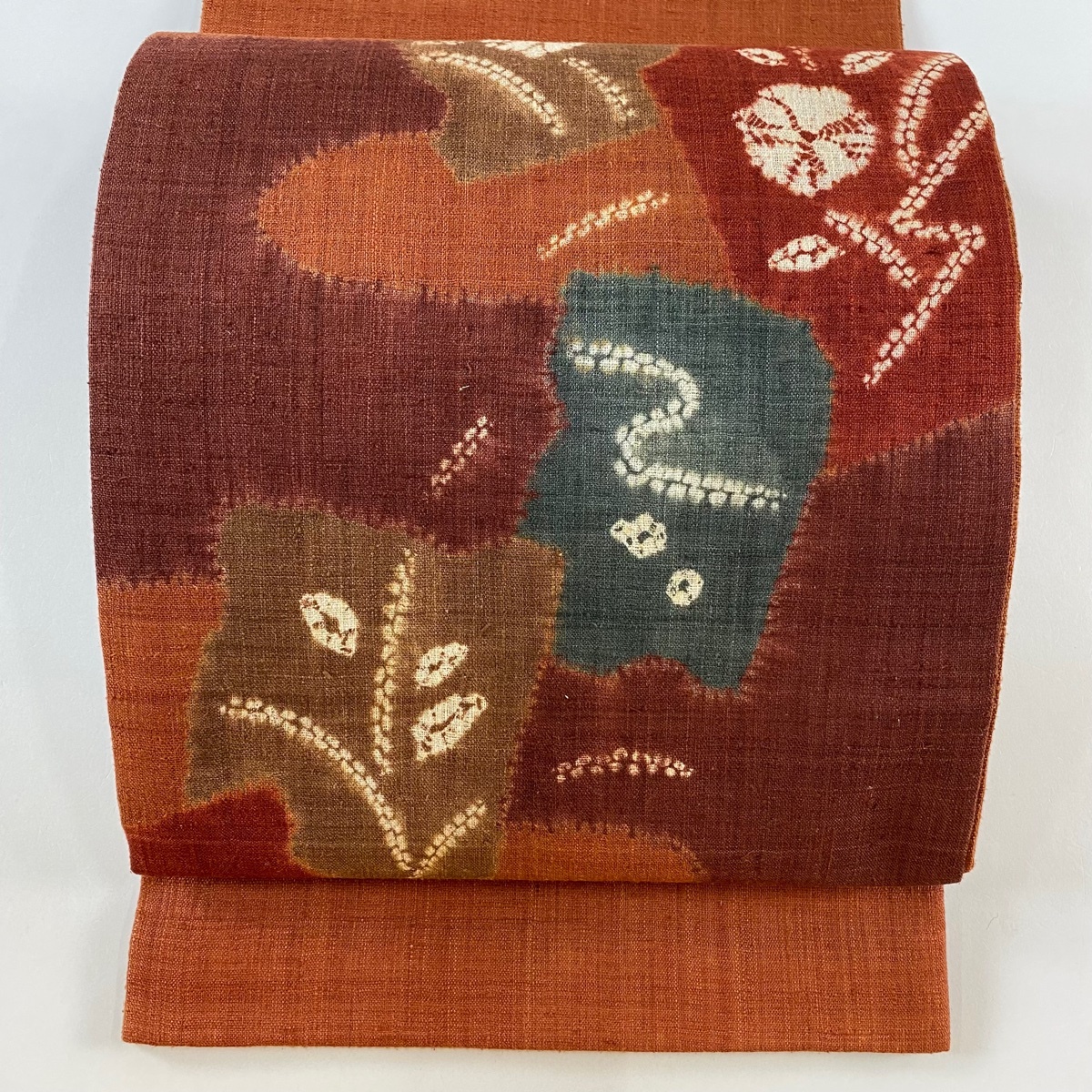 袋帯 秀品 紬地 破れ色紙 草花 絞り オレンジ お太鼓柄 正絹 【中古】拍卖