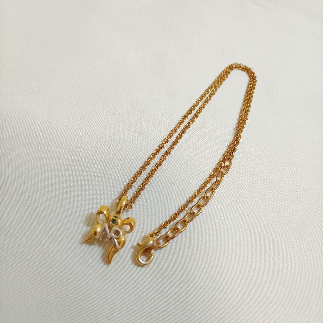 NINA RICCI ニナリッチ ネックレス ゴールド グリーン リボン型 正規品 送料無料 正規品 鑑定済み 人気ブランド 限定セール拍卖