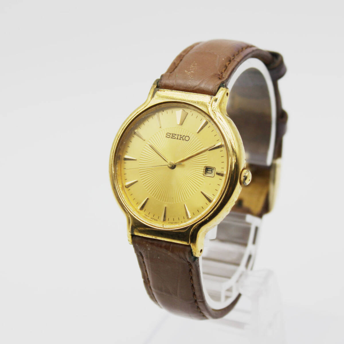 W25111301-29 SEIKO セイコー V732-0220 メンズ腕時計 クォーツ デイト ジャンク 文字盤ゴールド ラウンド拍卖