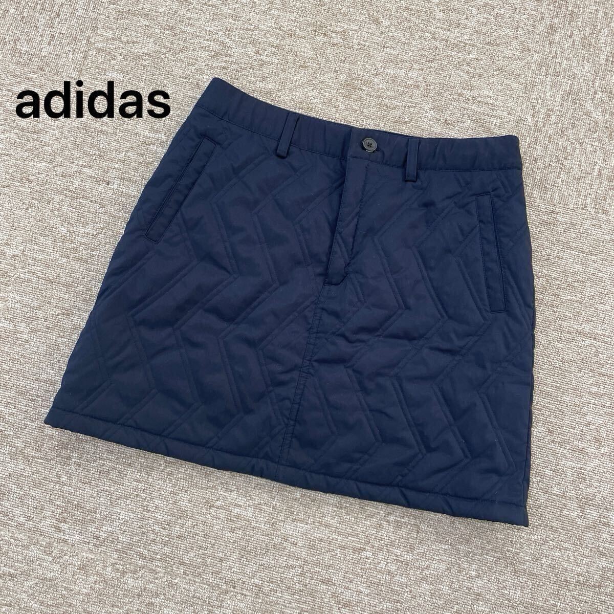 【A23】美品 adidas アディダスゴルフ ネイビー スカート テーラーメイド ゴルフウェア 中綿 キルティング 刺繍ロゴ Mサイズ拍卖