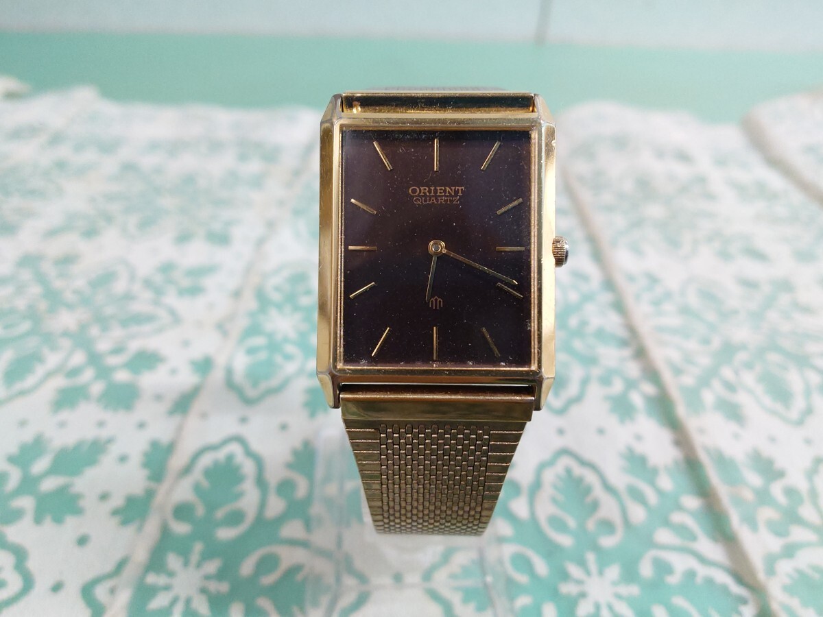 ● レトロ ヴィンテージ ORIENT オリエント GP 1510403-40 レクタンギュラー クォーツ ブラウン 文字盤×ゴールドカラー 動作品 ①拍卖