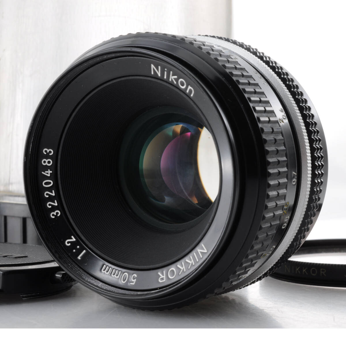 薄っすらくもりアリ値引き7,999円~【ニコン】New Nikkor 50mm F2 レンズ + プラスチックケース #M245拍卖