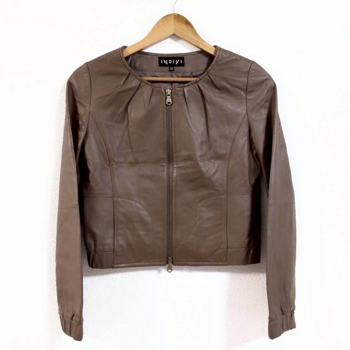 W1032【INDIVI】インディヴィ ノーカラー レザー ジャケット ジップアップ 本革 羊革 ブルゾン ブラウン レディース サイズ 38(M位) /Ha拍卖