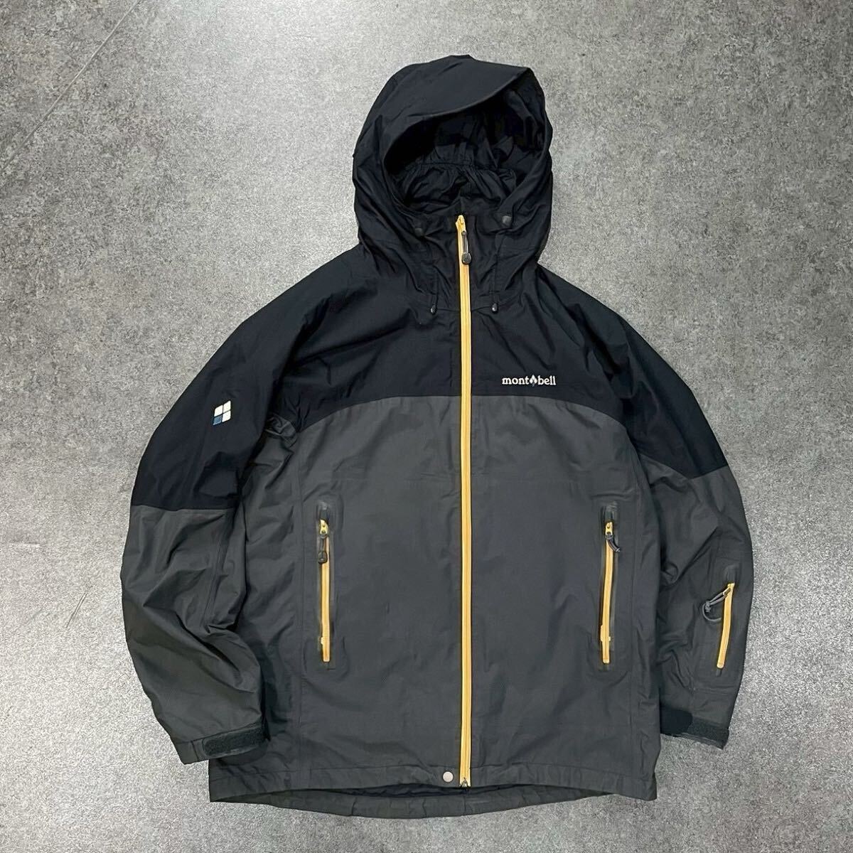 mont-bell モンベル Thinsulate 3M マウンテンパーカ フルジップ ナイロン 中綿 ストームジャケット バイカラー 刺繍 メンズ L 1102426拍卖