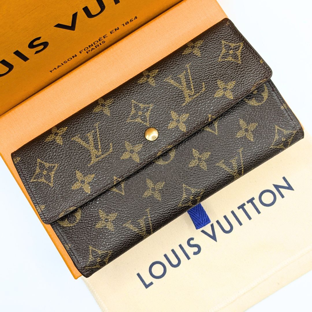 LOUIS VUITTON モノグラム ポルト トレゾール インターナショナル 長財布 三つ折り財布 M61215 TH0053拍卖