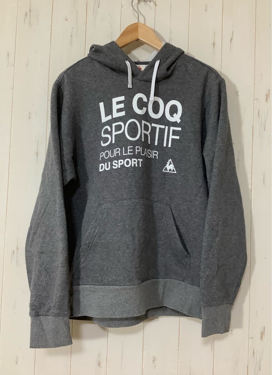 て1787 le coq sportif ルコック ビッグプリント フーディー スウェットパーカー プルオーバー L ダークグレー ロゴプリント 裏起毛 拍卖