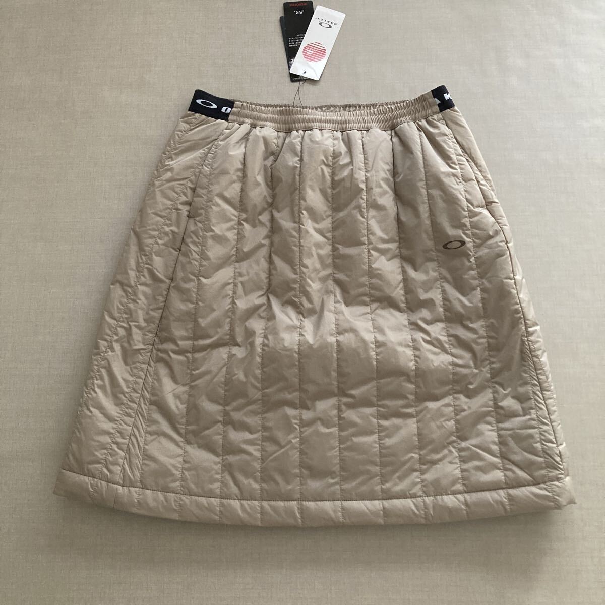 新品・未使用 OAKLEY 中綿スカート ◆ L ◆ FOA500666 ベージュ オークリー拍卖