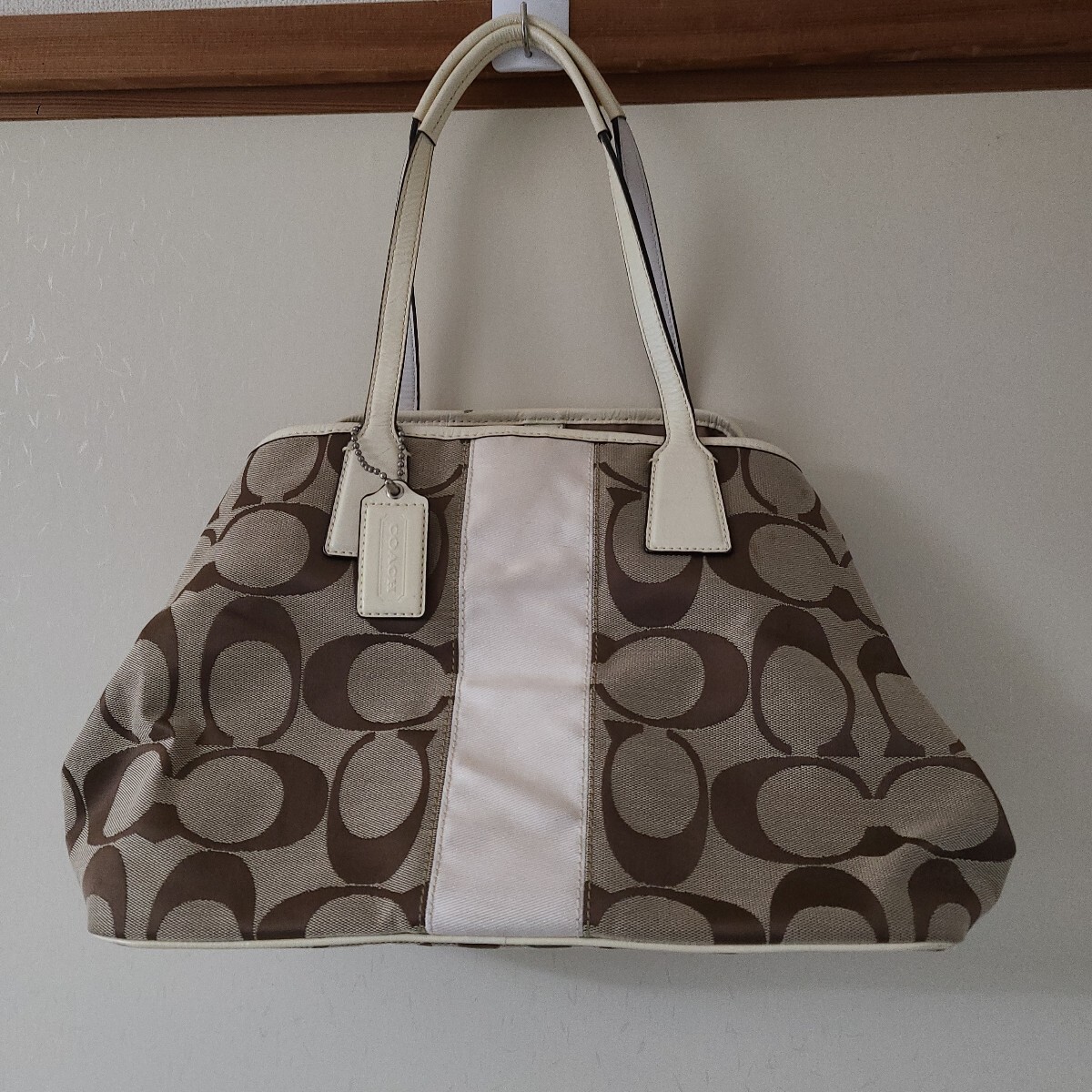 COACH、ベージュブラウンオーバルパターンハンドバッグ拍卖