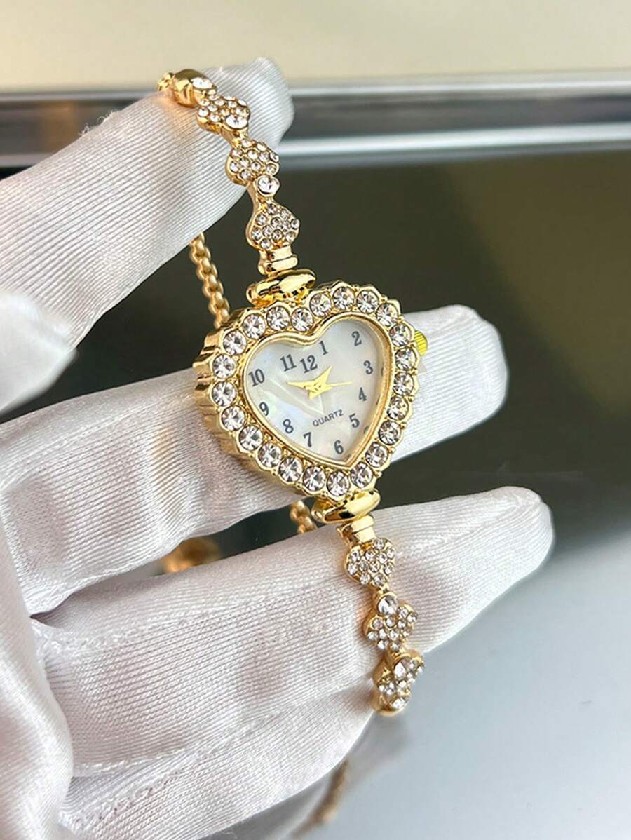 腕時計 レディース クォーツ 1個 レディース ゴールドトーン合金 全面クリスタル ハート型ケース アラビア数字ダイヤル クォーツ拍卖