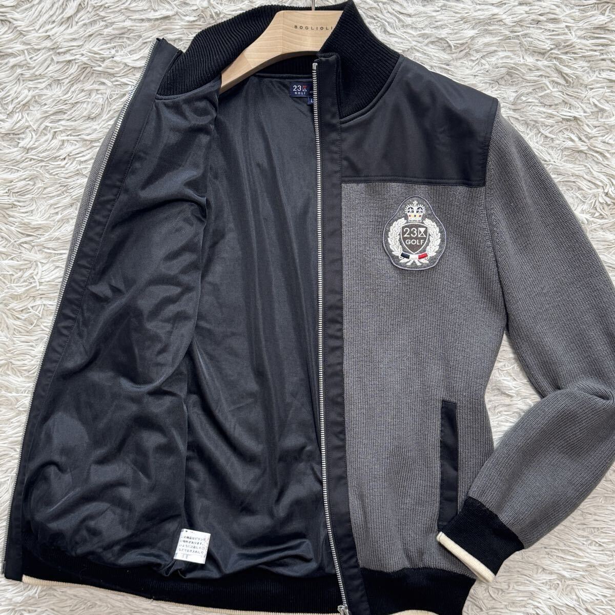 希少L 極美品 23区GOLF 切替 ドライバーズニット ダブルジップ ブルゾン ジャケット ロゴワッペン グレー ストレッチ 23区 ゴルフ 裏地有拍卖