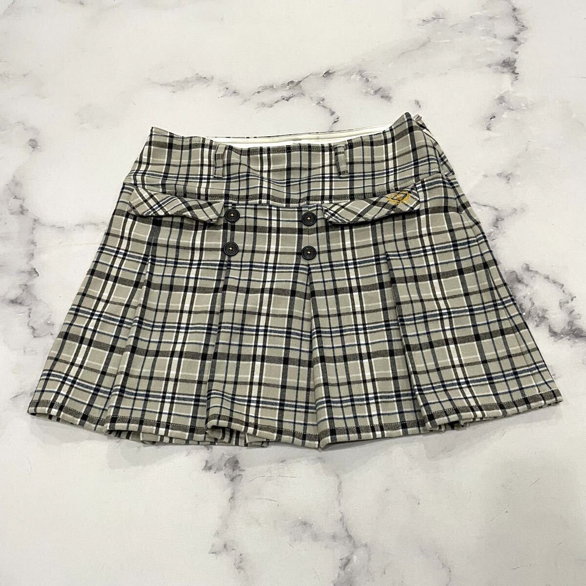 L ○ 都会のゴルフウェア '大きいサイズ' FILA GOLF フィラ ショート丈 チェック柄 台形スカート LL レディース ボトムス 古着 グレー拍卖