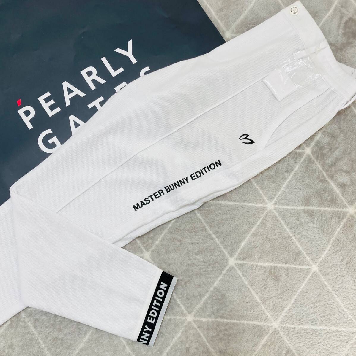 新品 パーリーゲイツ マスターバニー ミルコトーンリンクス 16G度詰鹿の子カレンダー加工 ジョガーパンツ(4)サイズM/白 33000 MASTER BUNNY拍卖