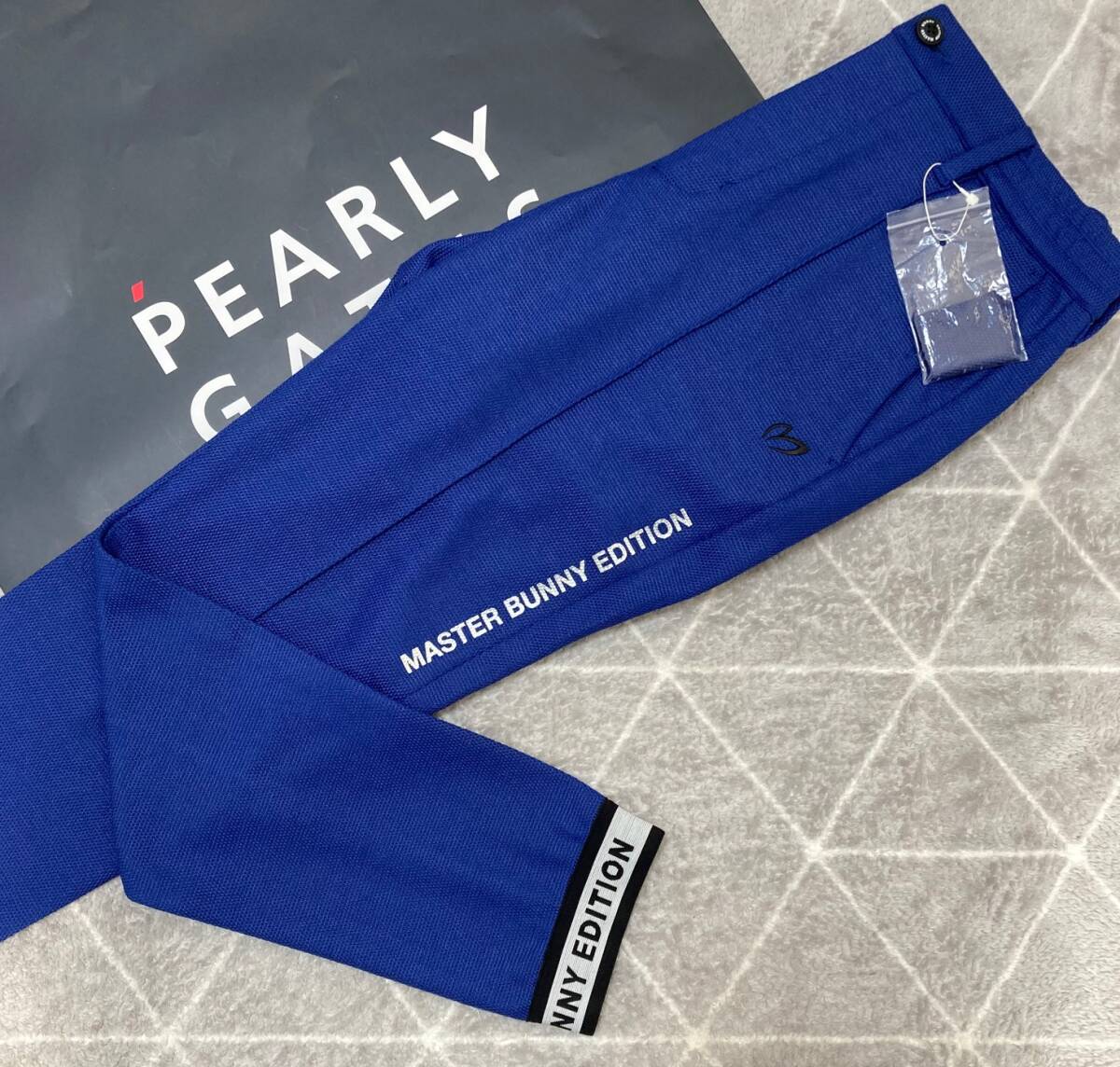 新品 パーリーゲイツ マスターバニー ミルコトーンリンクス 16G度詰鹿の子カレンダー加工 ジョガーパンツ(4)サイズM/青 33000 MASTER BUNNY拍卖