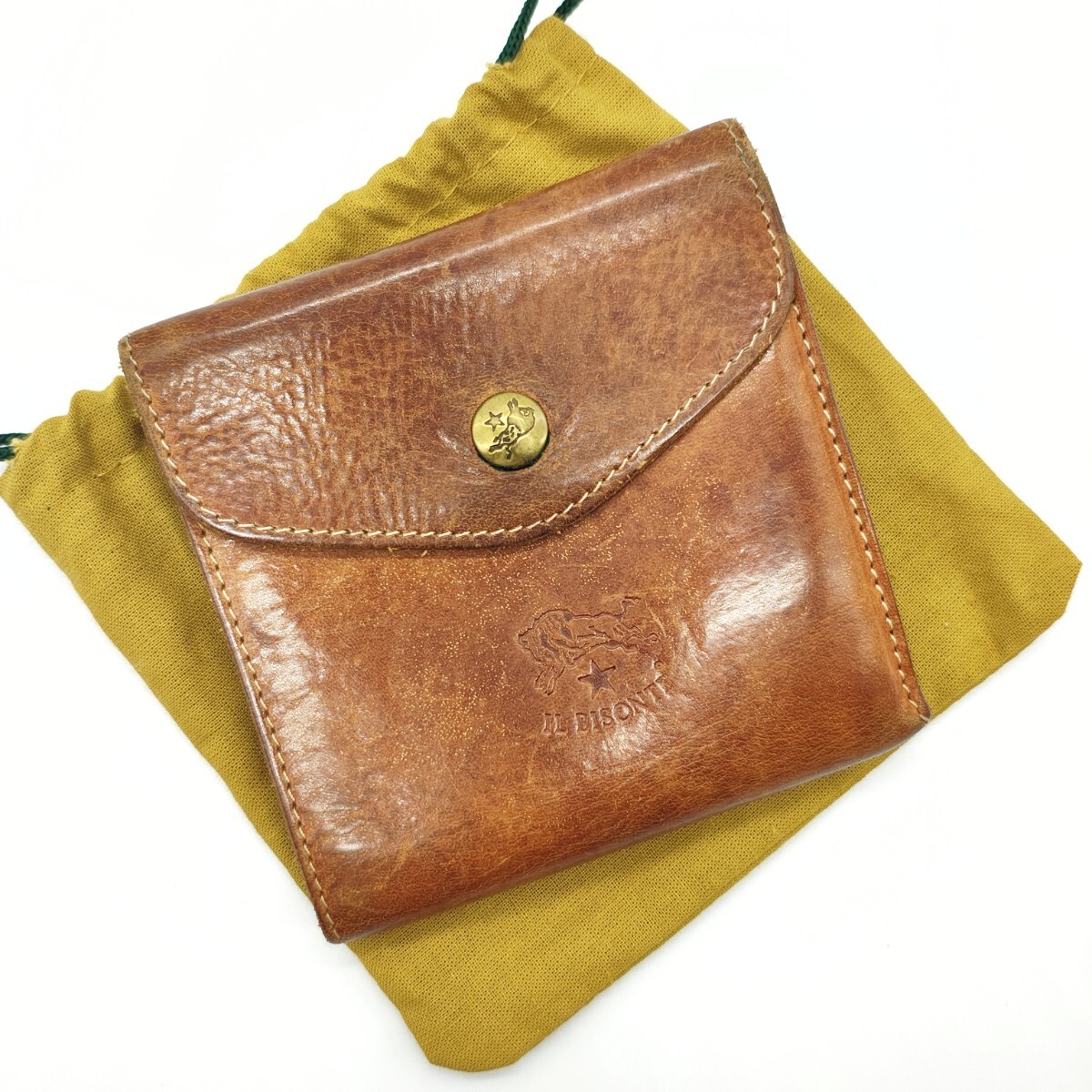 IL BISONTE イルビゾンテ 二つ折り財布 ヌメ革拍卖