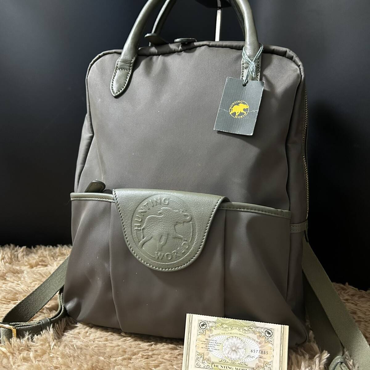 1円~【希少/美品】ハンティングワールド HUNTUNG WORLD リュック バックパック デイパック メンズ ビジネス デカロゴ ナイロン カーキ 革拍卖