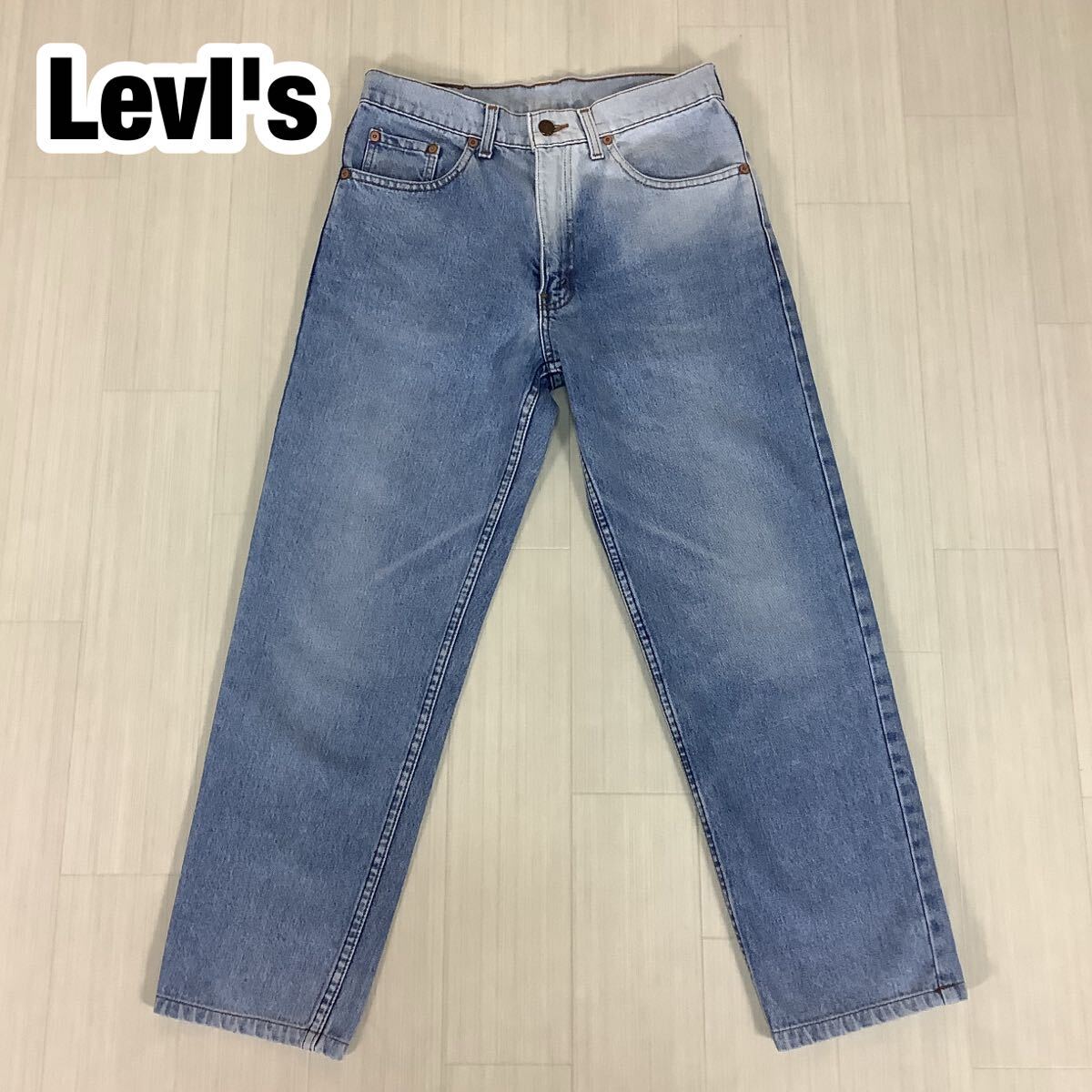 Levi LevI's リーバイス デニムパンツ ジーパン テーパードシルエット ライトインディゴ 革パッチ拍卖