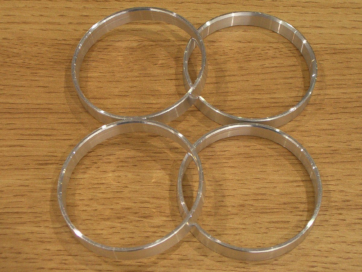 日産 4穴ホイールを ホンダ 4穴車に装着 ハンドルブレ対策 ハブリング ハブ径変換リング 4個 外径60mm→内径56mm拍卖