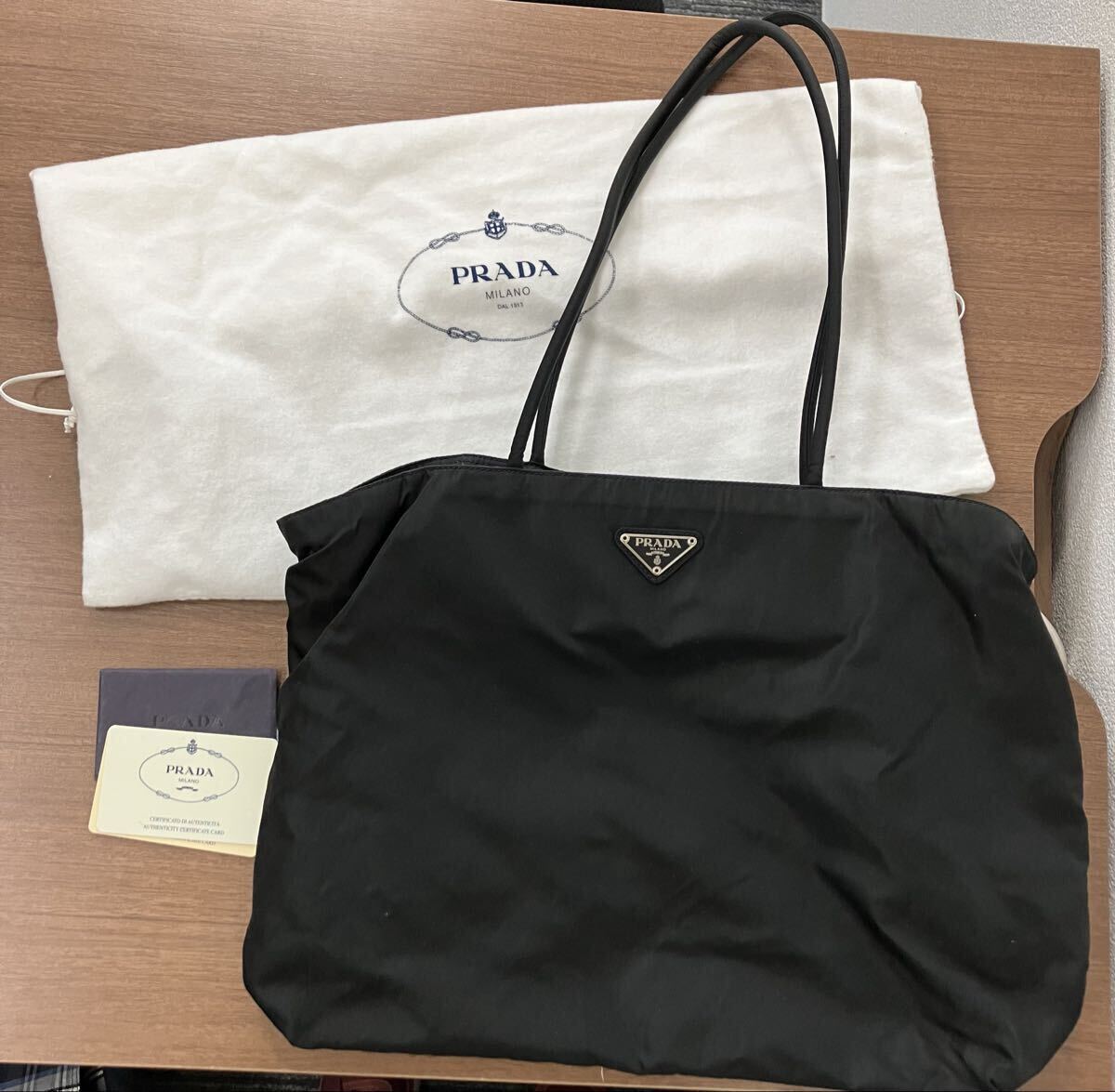 PRADA プラダ ナイロン トートバッグ ブラック ハンドバッグ 黒 ロゴプレート 保存袋あり 1円〜 拍卖