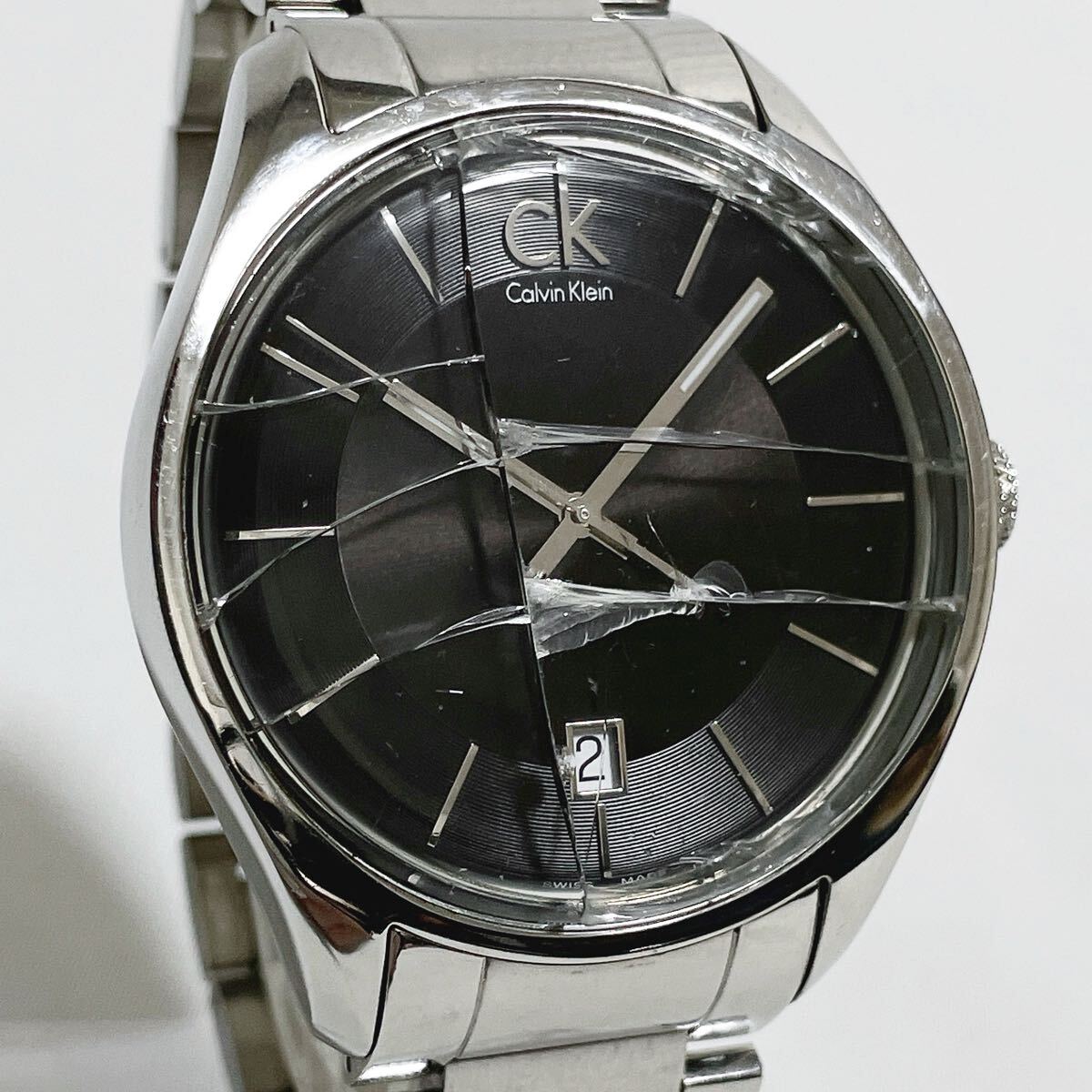 稼働品 Calvin Klein カルバンクライン K2H 211 デイト 黒文字盤 ロゴ シルバー系 QZ クォーツ メンズ腕時計 予備コマ付き拍卖