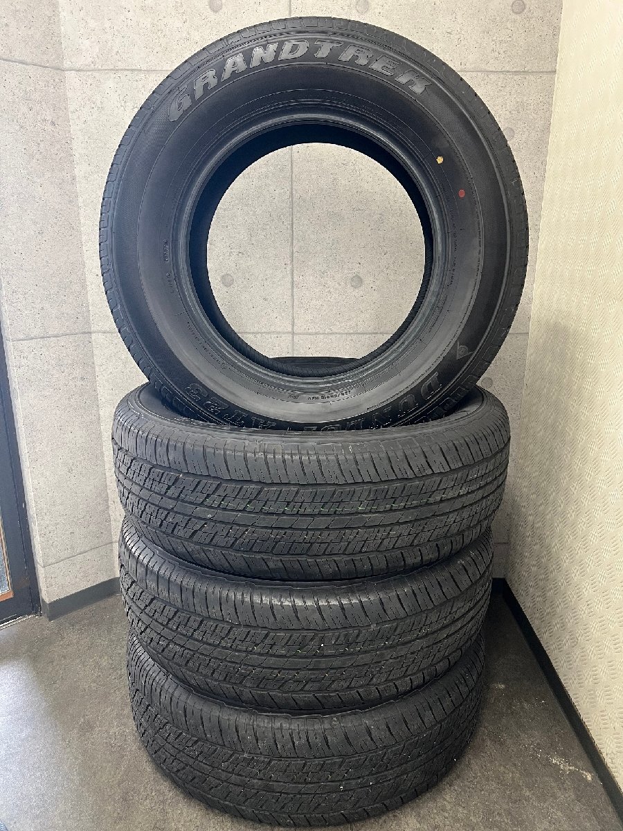 タイヤ トレッド新横浜師岡店 中古夏タイヤ 4本 DUNLOP グラントレック AT23 265/65R18 2023年製 ランクル300純正拍卖