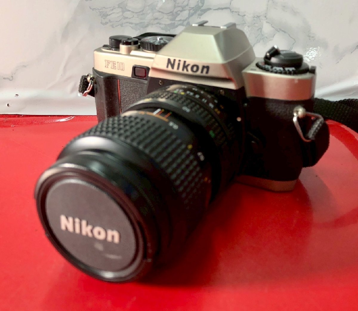 ● Nikon ニコン FE10 Nikon Zoom-NIKKOR 35-70mm 1:3.5-4.8 一眼フィルムカメラ シャッターOK ストロボ接続時発光OK拍卖