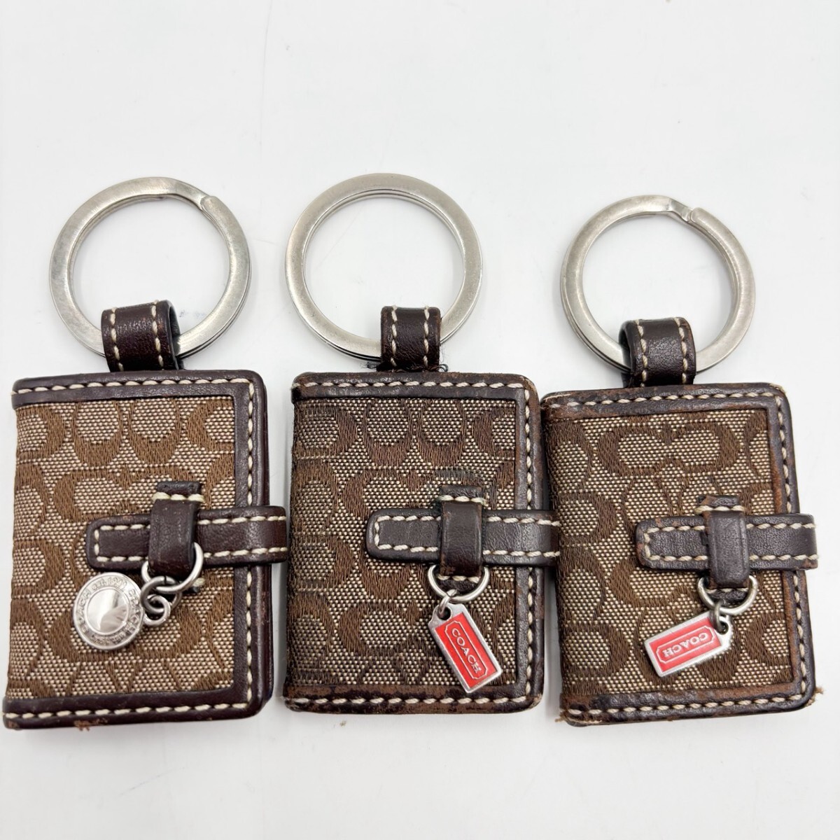 1円スタート コーチ COACH キーホルダー チャーム キーリング シグネチャー キャンバス ブラウン レザー フォトフレーム 3点セット まとめ拍卖