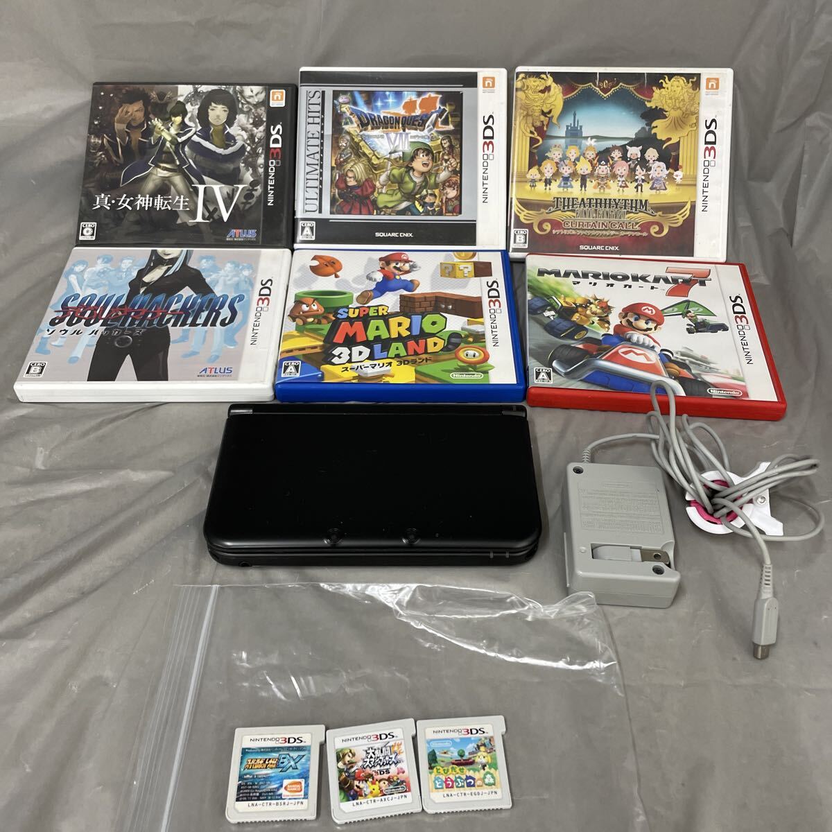 【B789-11】【通電確認済み】ニンテンドー3DSLL ブラック SDカード入り + ソフト9点 + 専用アダプター まとめ売り拍卖