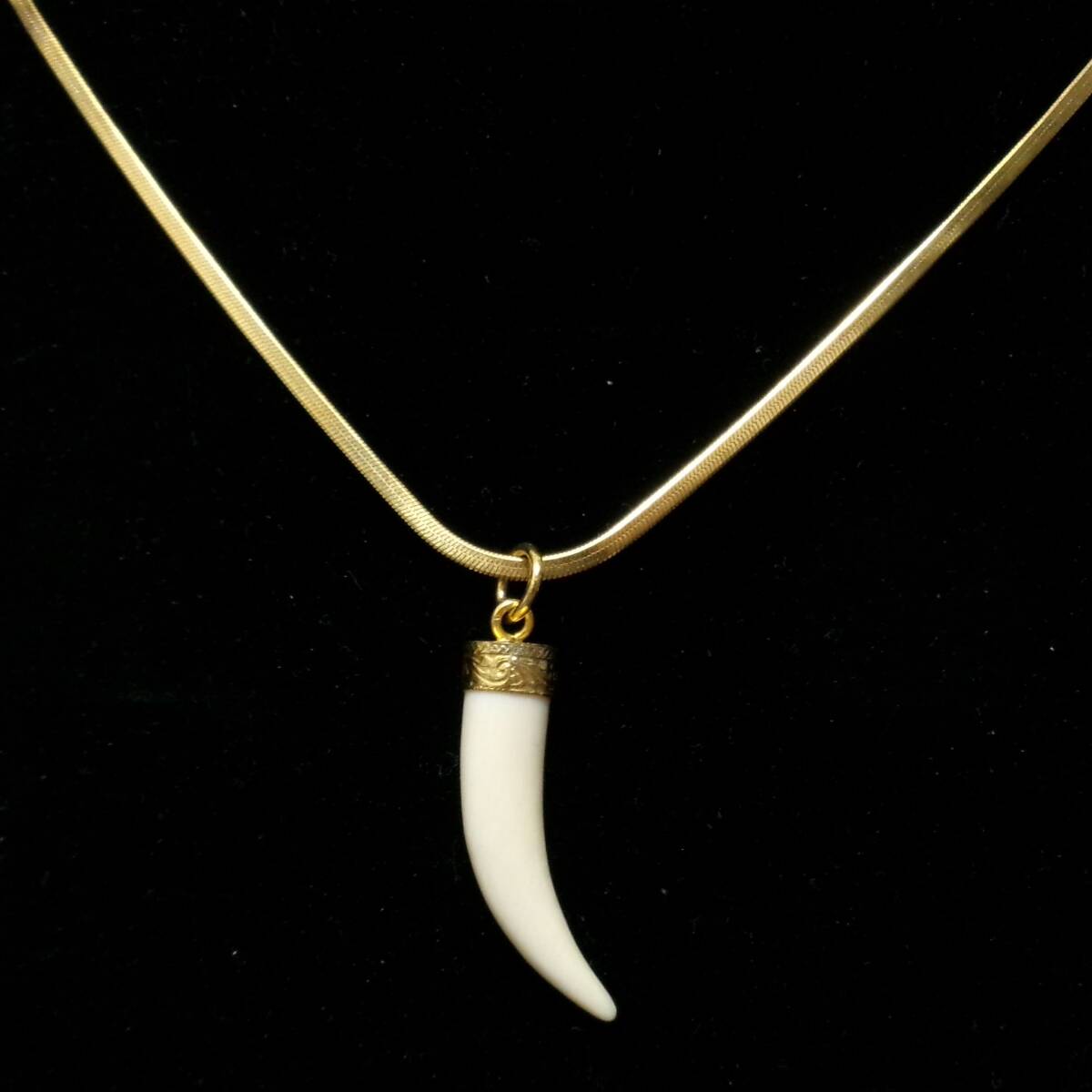 牙 ネックレス 50cm 大網てんとう虫 2481拍卖