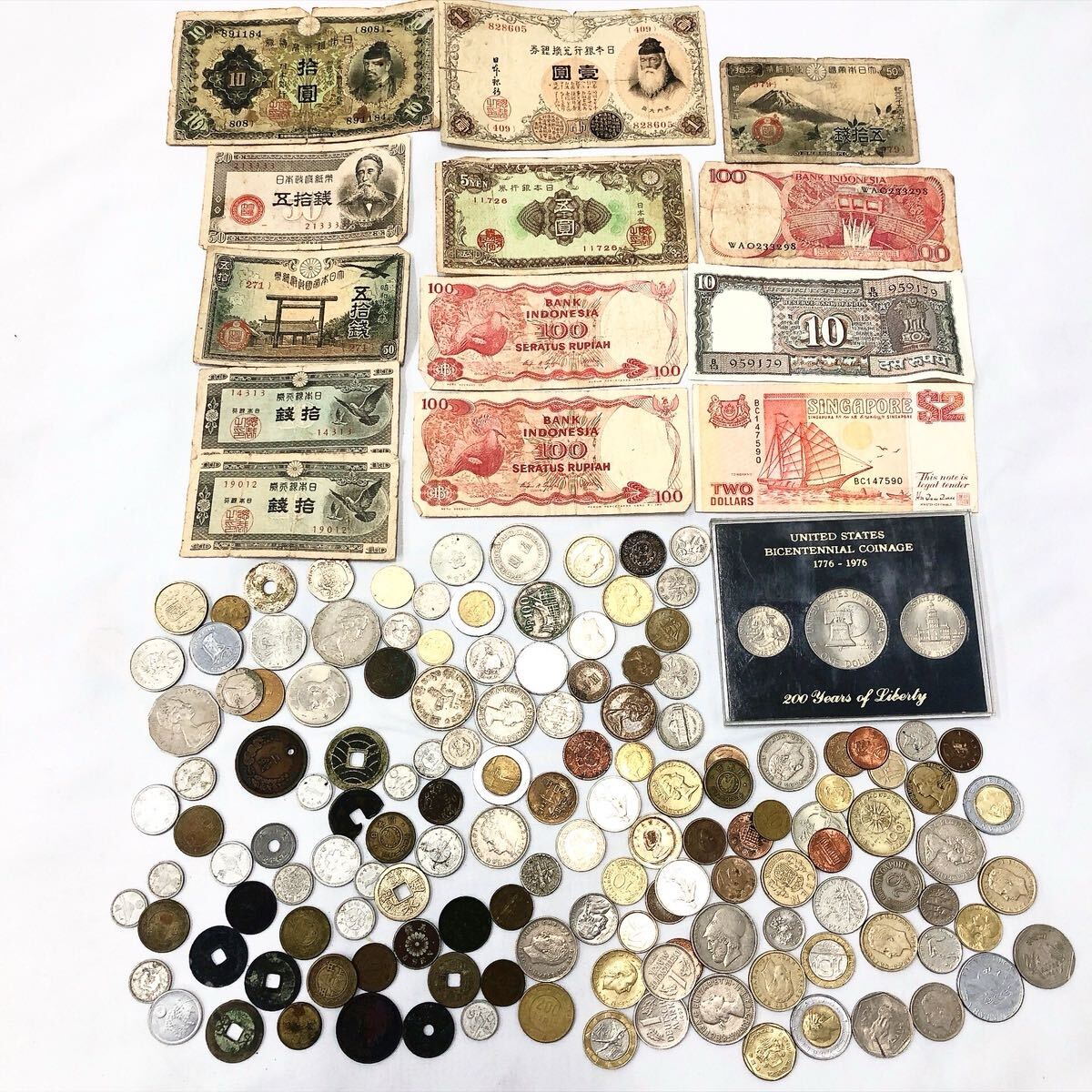 ★3-1015 外貨 日本硬貨 外国紙幣 紙幣 穴銭 まとめて 大量 約783.5g(パケ含む)拍卖