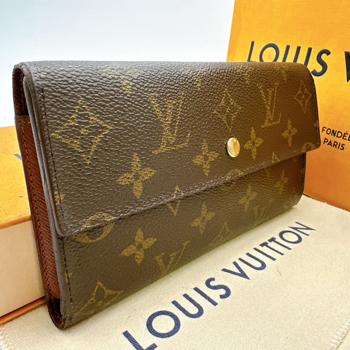 5911【上美品】LOUIS VUITTON ルイヴィトン モノグラム ポルトトレゾール インターナショナル 長財布 三つ折り財布 M61215/TH0040拍卖