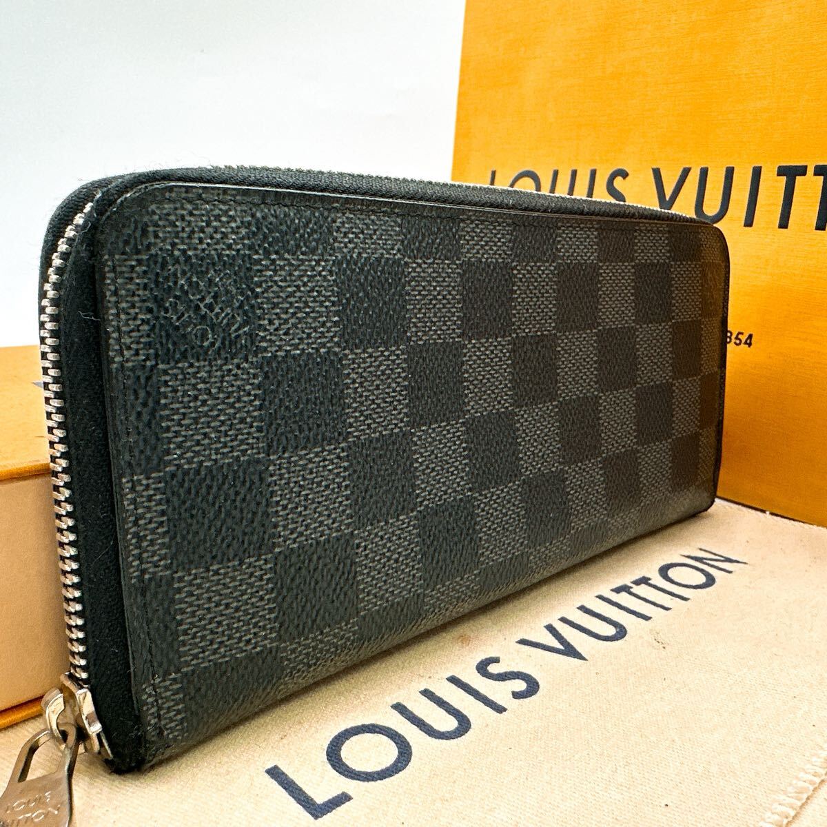 5917【上美品】LOUIS VUITTON ルイヴィトン ダミエグラフィット ジッピーウォレット ヴェルティカル 長財布 N63095/CA4101拍卖