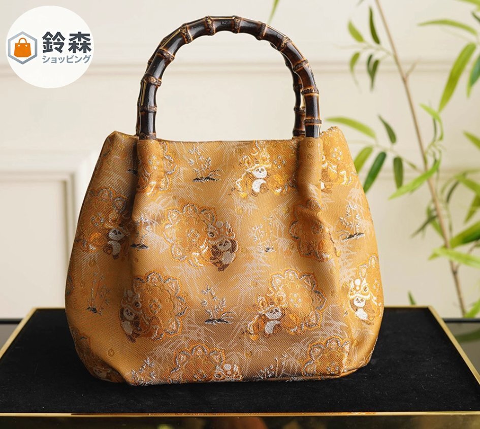 シルクのバンブーテクスチャーハンドバッグ、ゴールドのニッチなショルダーバッグ拍卖