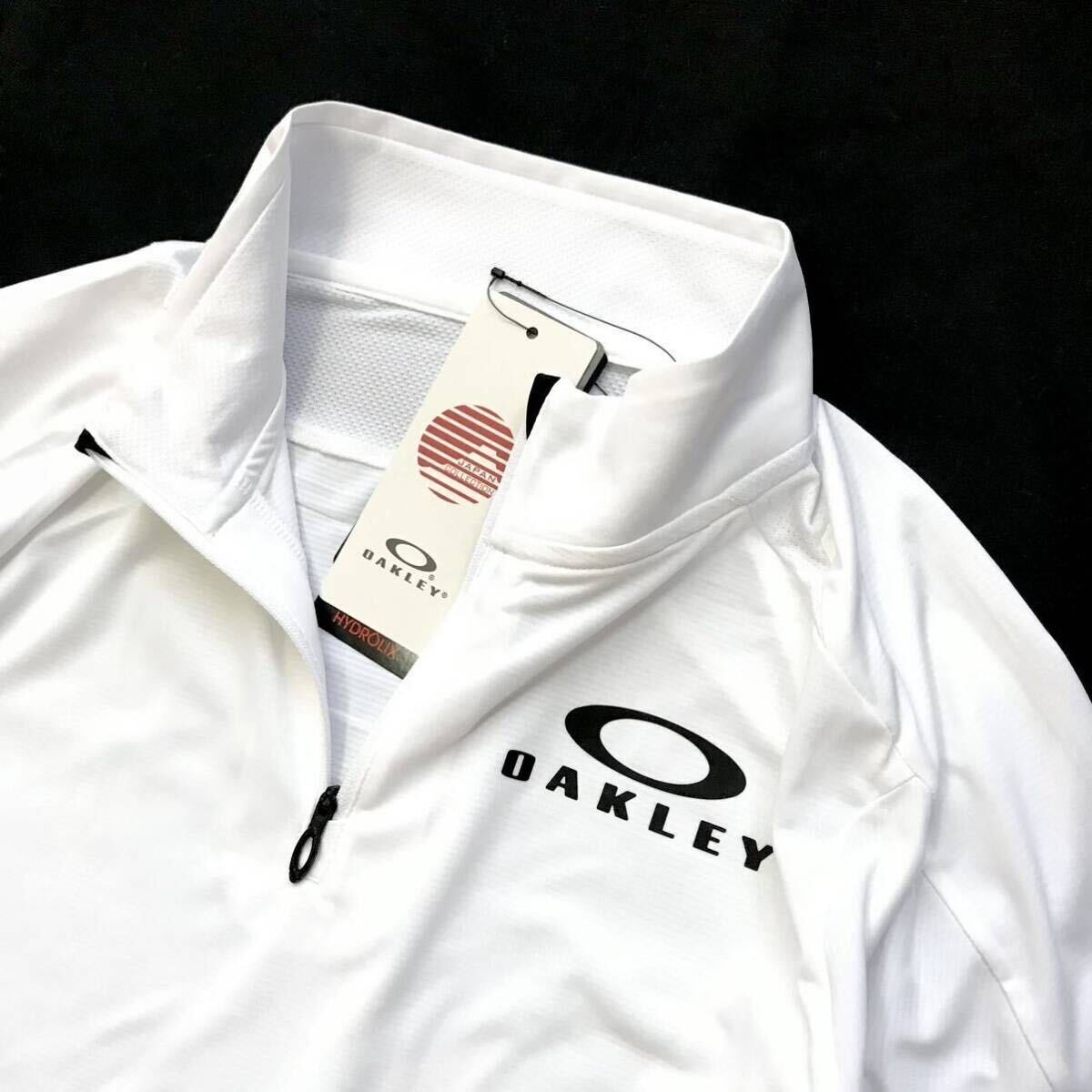 ▲B447新品 【日本Lサイズ】白 最新 JAPAN CLLECTIONオークリー(OAKLEY)Enhance 半袖 ゴルフ ハイネック モック ハーフジップ シャツ拍卖