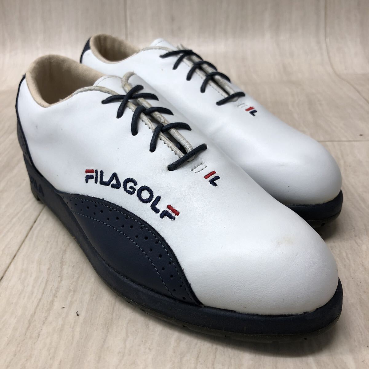 M332 FK-251029-437 FILA フィラ GOLF ゴルフ ゴルフシューズ トレーニングシューズ ローカット ホワイト系 ネイビー レディース 24cm拍卖