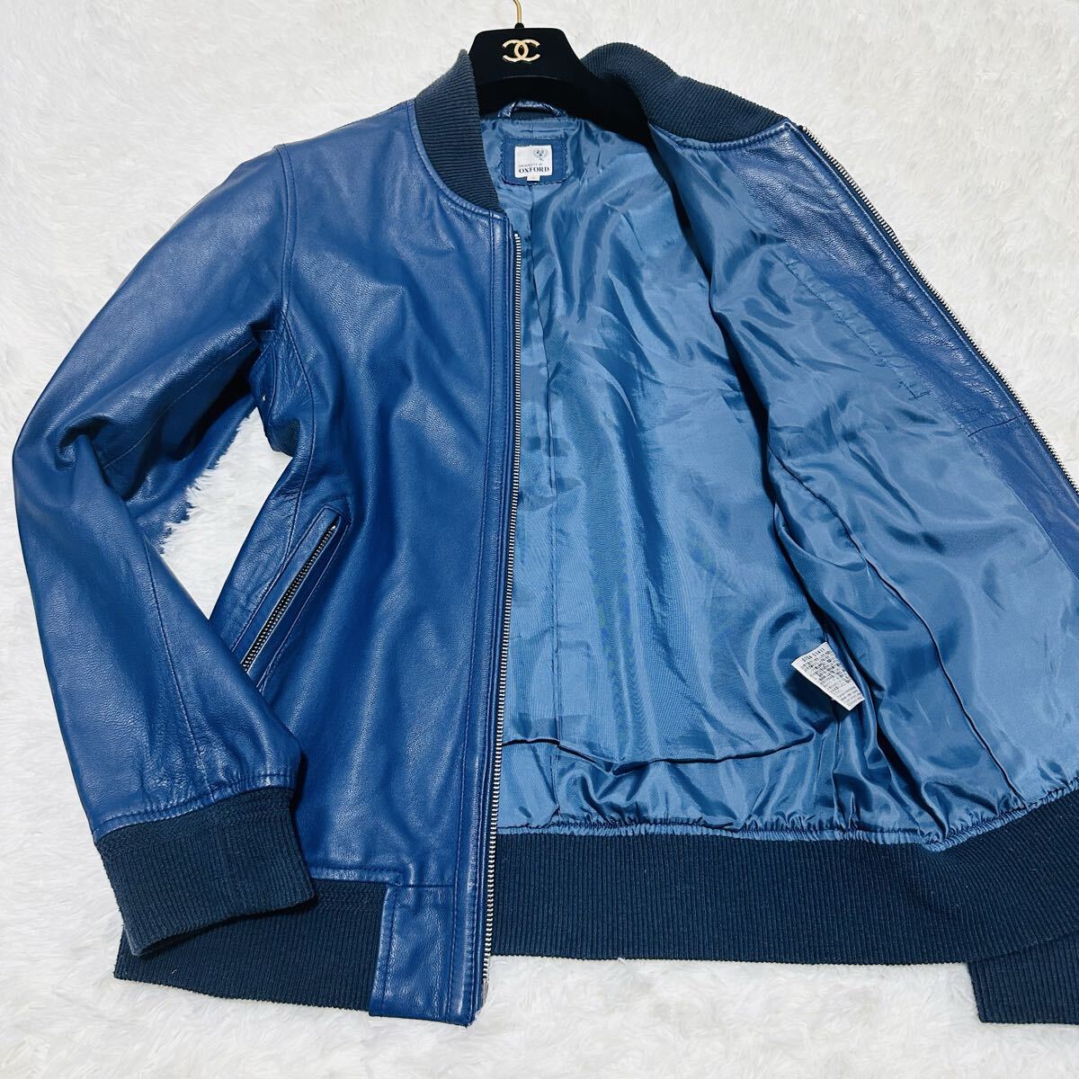 【美品】レザージャケット シングルライダース 羊革 ラムレザー ブルー 本革 ブルゾン ネイビー オックスフォード大学 レザージャケット拍卖