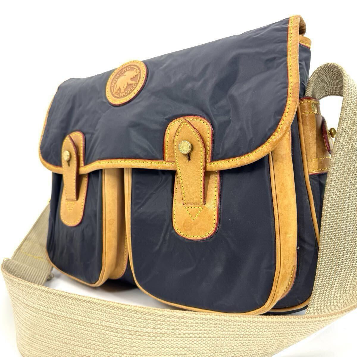 【美品】HUNTING WORLD ハンティングワールド バチュークロス ショルダーバッグ メッセンジャー バック レザー 本革 斜め掛け ネイビー拍卖