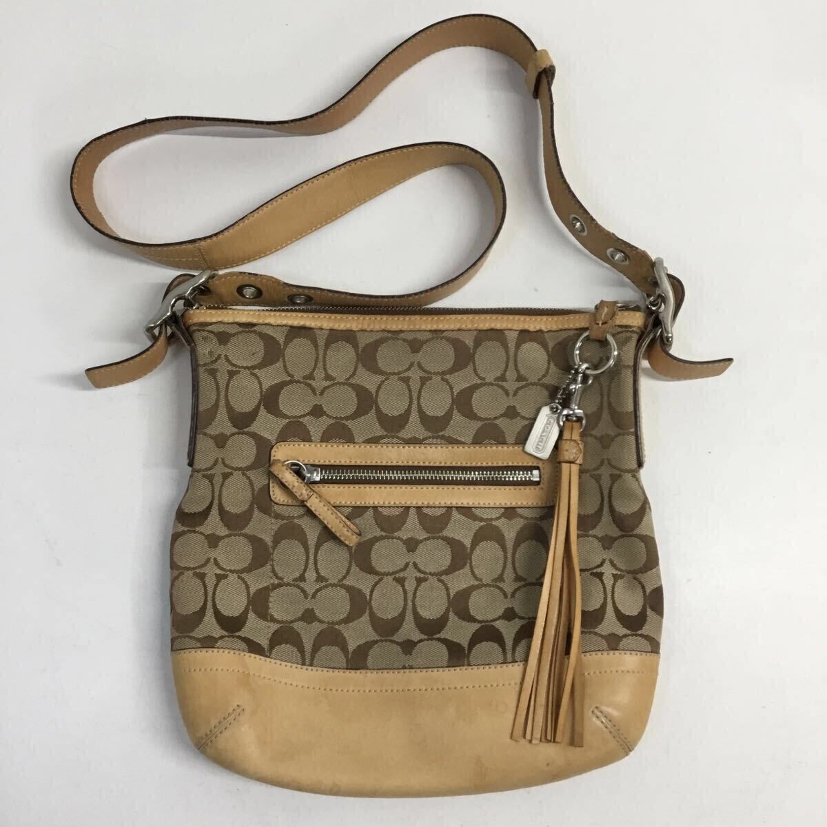 COACH コーチ シグネチャー ショルダーバッグ サコッシュ クロスボディ 斜め掛け 鞄 キャンバス レザー タッセル ベージュ系 ユニセックス拍卖