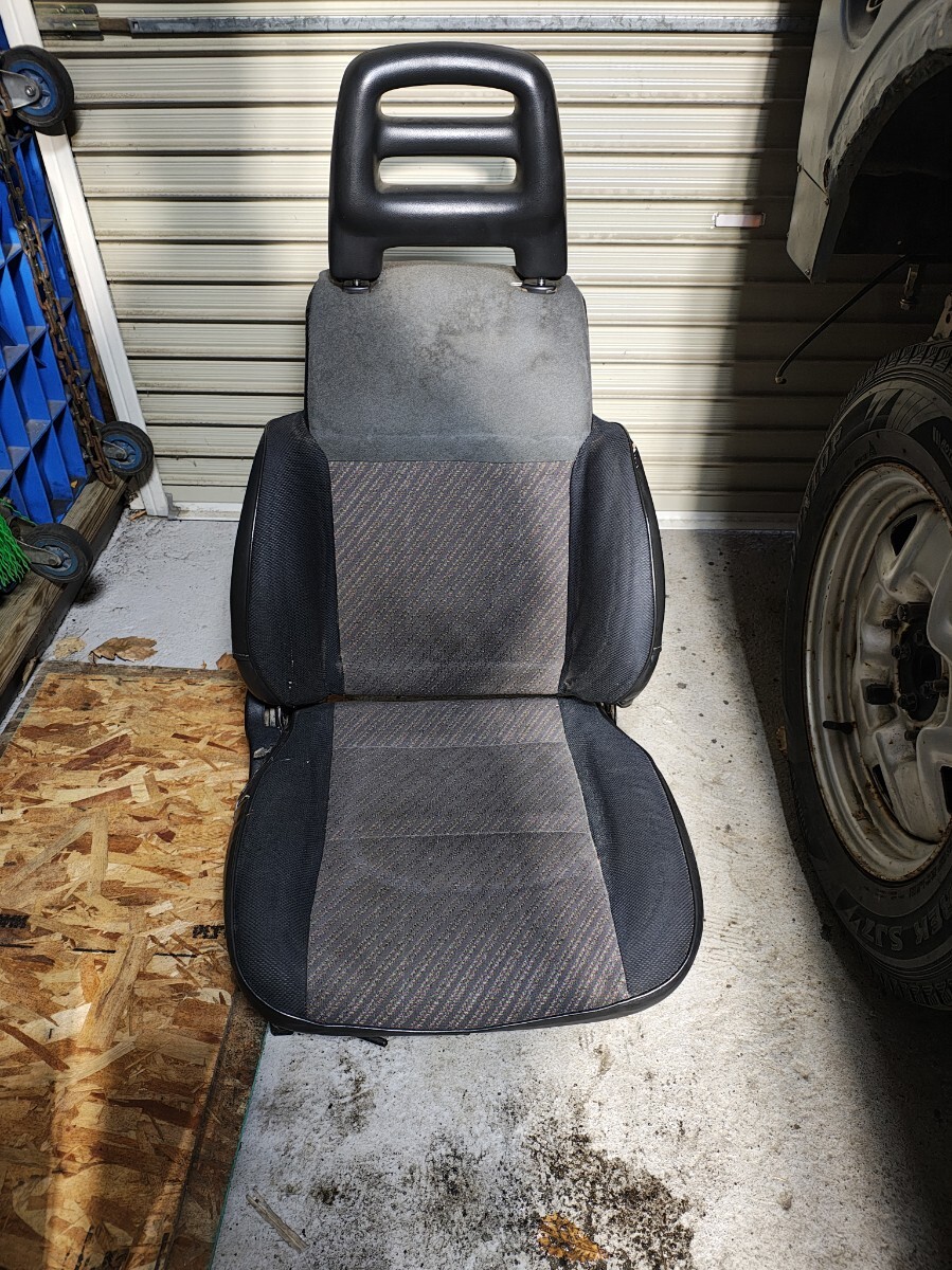 JA11Vジムニー1型●フロント右シート 運転席シート 右側 破れあり シートレール付拍卖