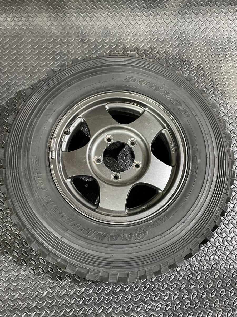 ジムニー JA11純正ホイール ダンロップグラントレックMT 7.00R16 一本のみ スペアタイヤに拍卖