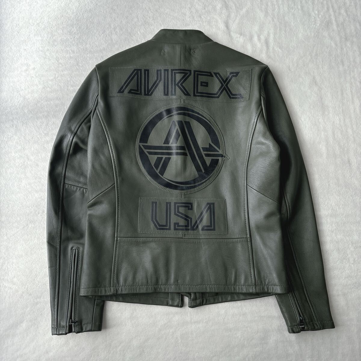 【未使用に近い】アヴィレックス レザージャケット カーキ やぎ革 刺繍 ライダース メンズ バイカー STREET GEAR ROAD AVIREX拍卖