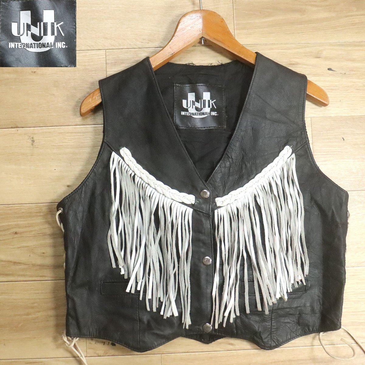 H3S/S6.10-1 アメリカ古着 UNIK INTERNATIONAL INC. フリンジ コンチョ レザーベスト 本革 サイドレースアップ レディース 拍卖
