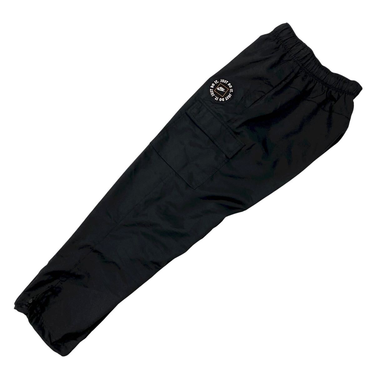 NIKE(ナイキ)ナイロンカーゴパンツ ウィンドパンツ JUST DO IT. メンズM ブラック拍卖