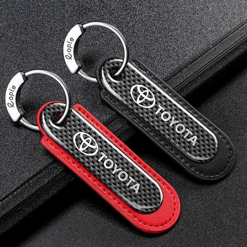 トヨタ カーボンキーホルダー 本革レザー 車のキーチェーン 車のキータグペンダント 高級 キーリング 外せるリング ブラック/レッド拍卖