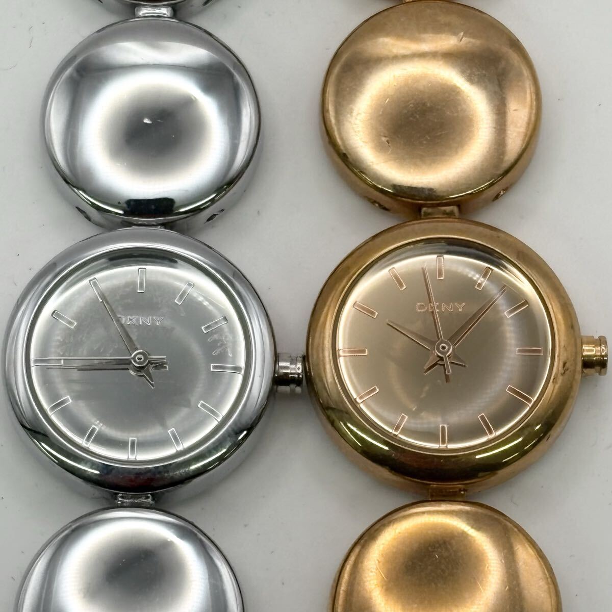 1812〓 2点セット DKNY ディーケーエヌワイ ダナキャランニューヨーク 腕時計 レディース シルバー ブロンズ 時計 クォーツ 3針 服飾小物拍卖