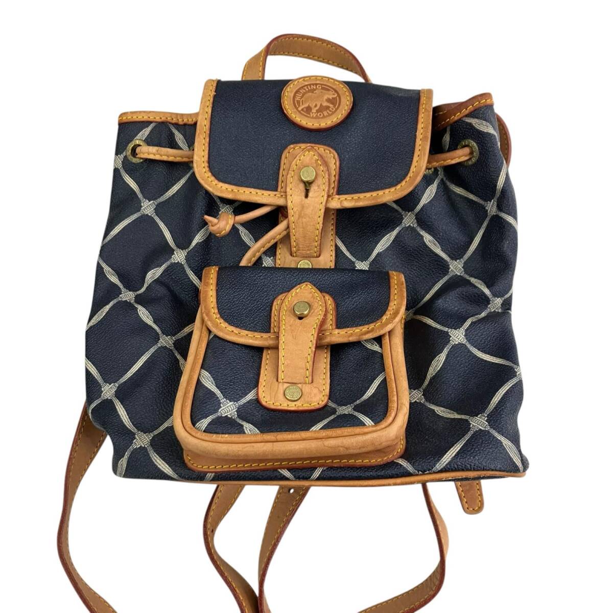 186005 訳アリ品 HUNTING WORLD ハンティングワールド PVC レザー ミニリュック ネイビー 総柄拍卖