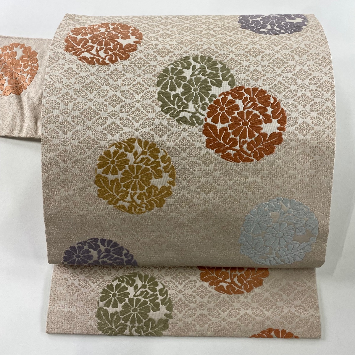 名古屋帯 名品 花丸紋 地紋 唐織 ピンクベージュ 正絹 【中古】拍卖