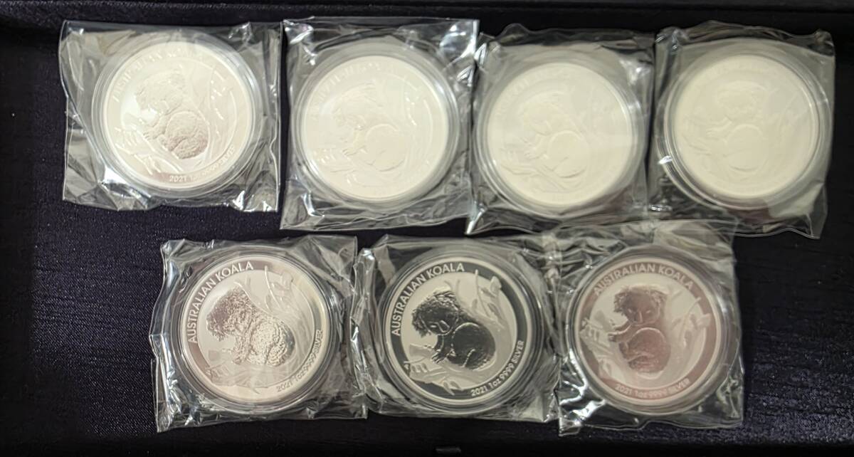 19183【未使用】オーストラリア 1ドル銀貨 1oz 7枚 エリザベス2世 コアラ 2021年 包装無しでそのまま封入して発送拍卖