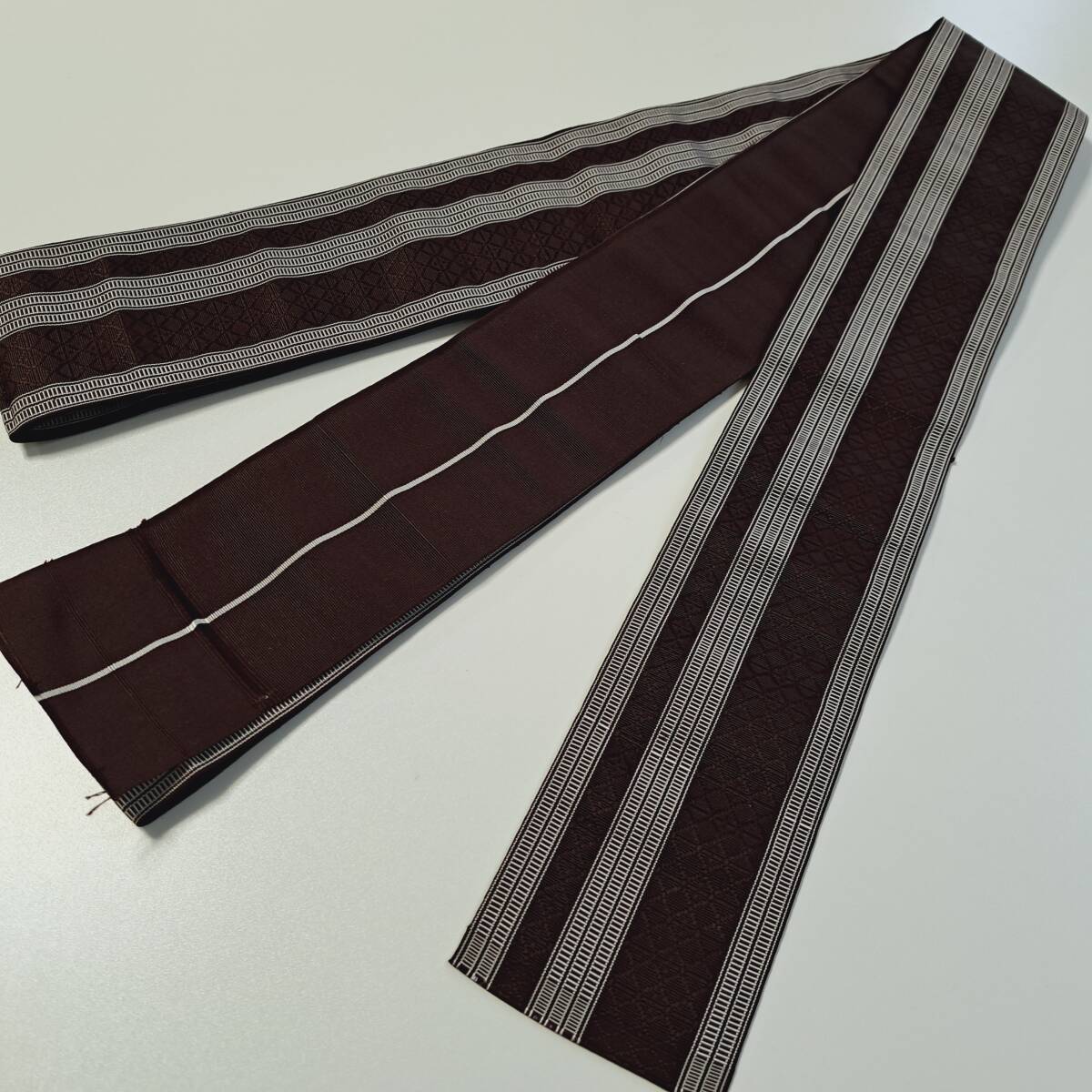 即決■着物の越田■幅9 長さ409 正絹 角帯 本場筑前博多織 縞 オシャレ シック 茶系 ■も10J03拍卖