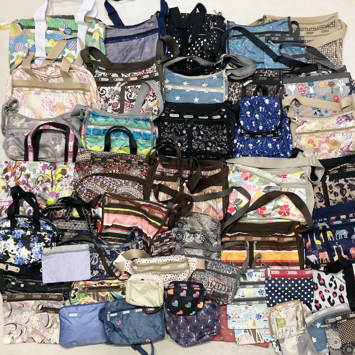 ● LeSportsac レスポートサック まとめ商品 50点以上 大量まとめ バッグ ショルダー リュック など スヌーピー コラボ 総柄 現状品 9.8kg拍卖